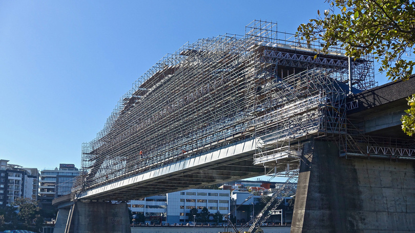 Scaffolding erected around a bridge undergoing structural repair